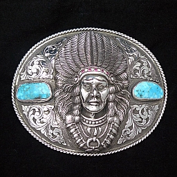 CHIEF SEVERO ROPE EDGE TROPHY WITH TURQUOISE, DIAMONDS AND RUBIES.