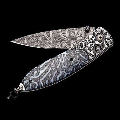 MONARCH DEPARTURE FOSSIL BRAIN CORAL AND STERLING SKULL FOLDING KNIFE WITH DAMASCUS BLADE